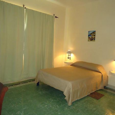 Hotel Suites Córdoba Quarto foto
